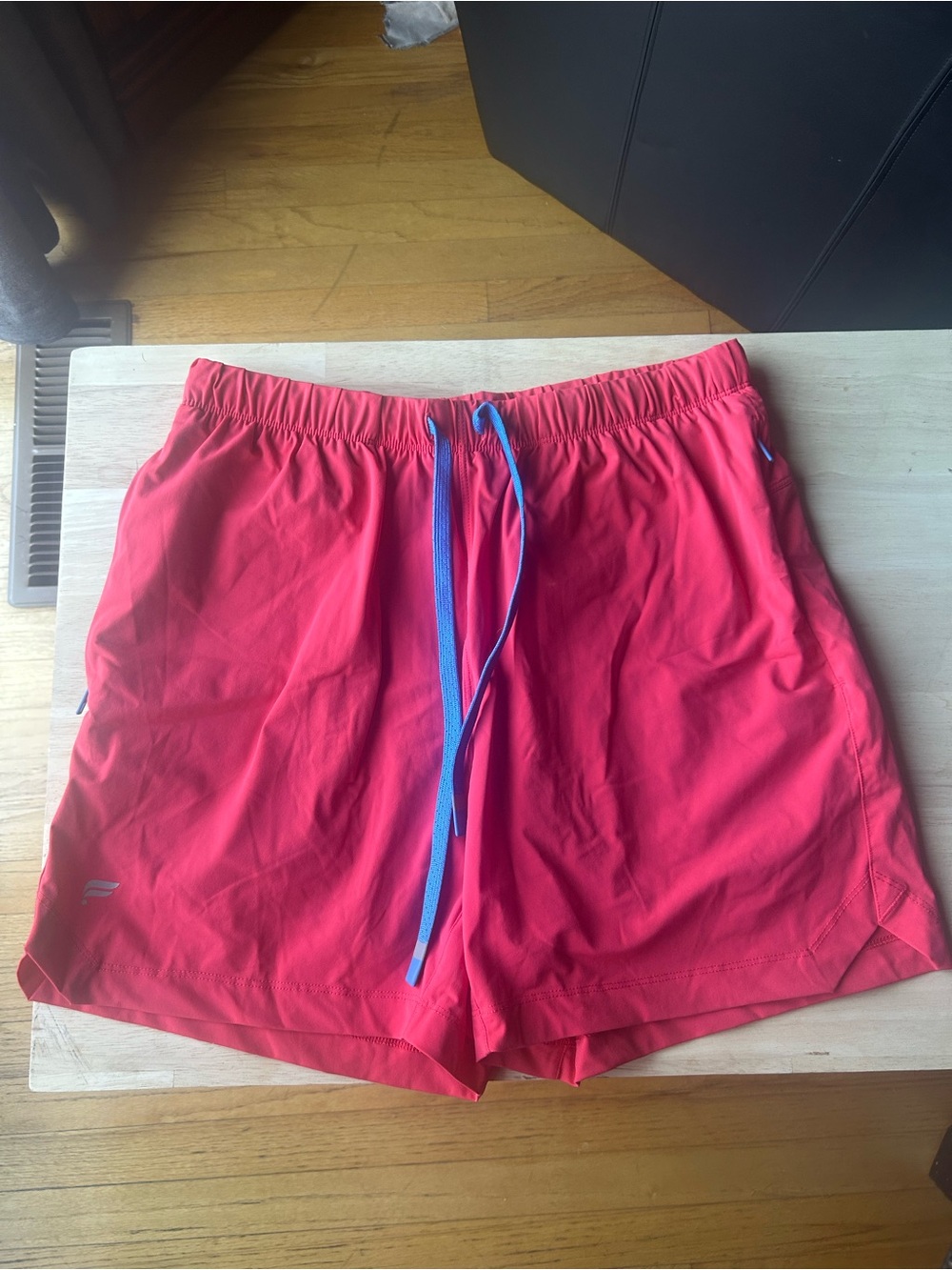 Fabletics Bright Coral Athletic Shorts with Blue Drawstring